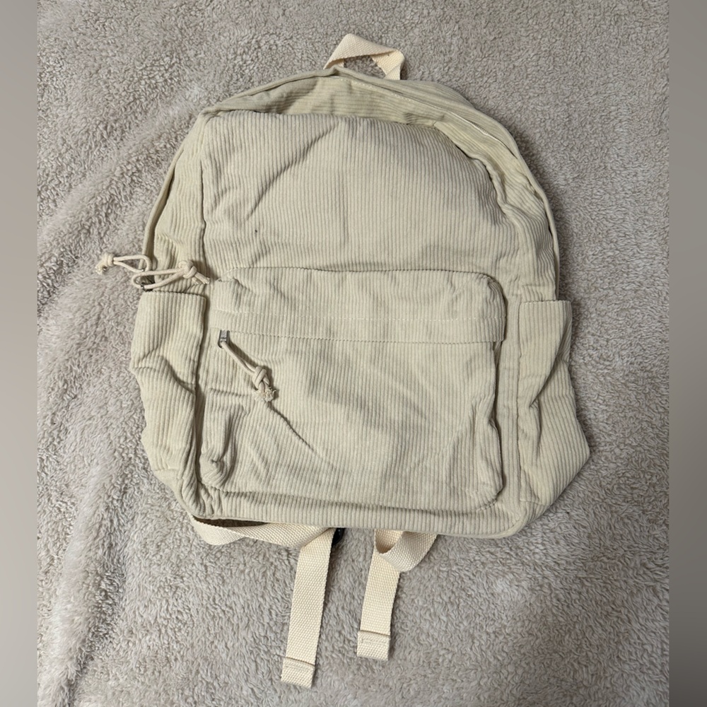 Cream Canvas Backpack with Minimalist Design